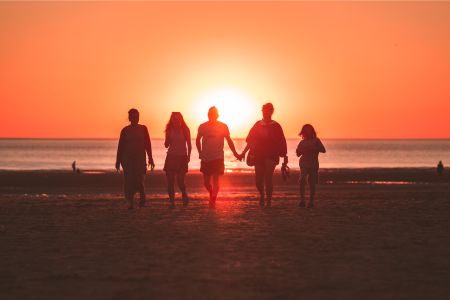 Family on Beach at Sunset