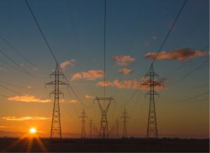 High voltage transmission lines carry electricity across vast distances